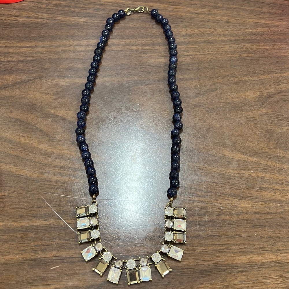 Costume long necklace. Navy beading. Multi color stones.